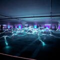 linked neon lights under white painted basement