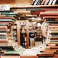 books on brown wooden shelf