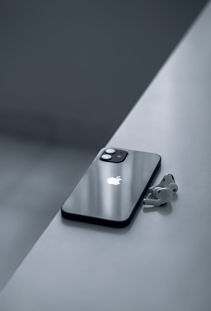 silver iphone 6 on white table