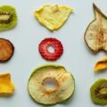 sliced apple and red round fruit