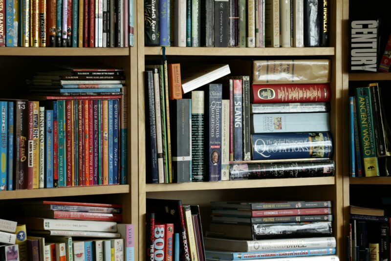 a book shelf filled with lots of books