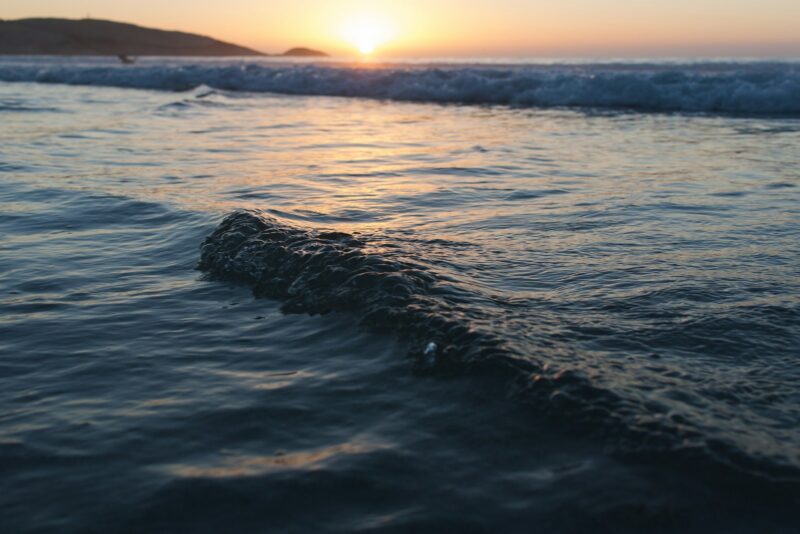 body of water at golden hour