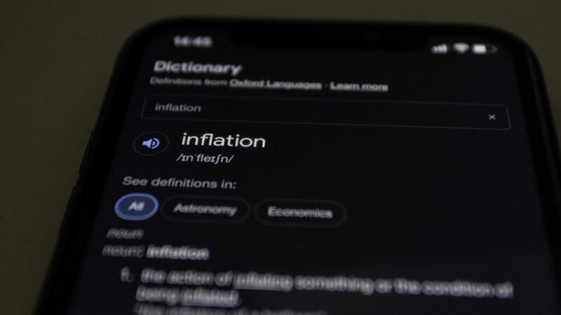 a close up of a cell phone with information on the screen